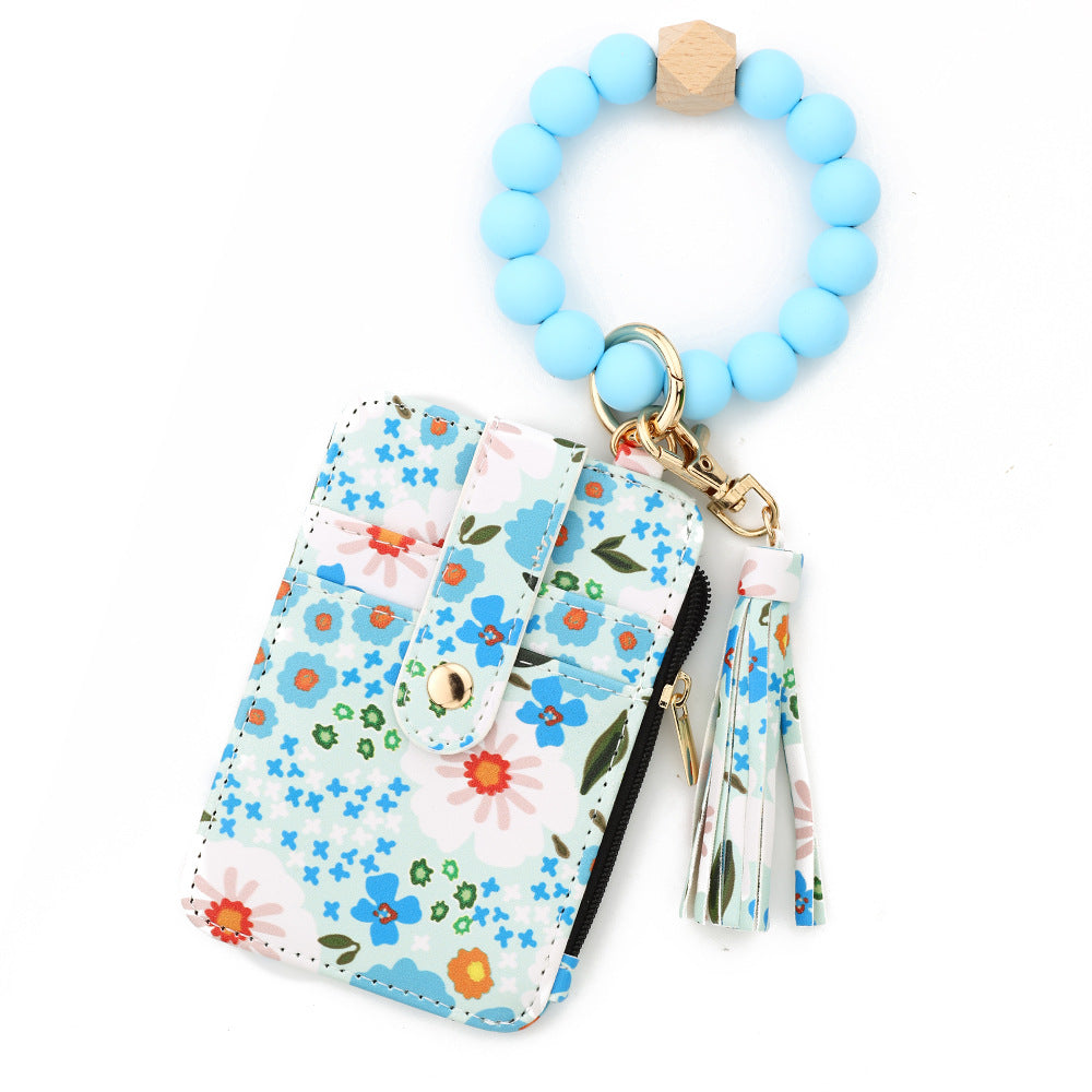 ID bag, silicone bracelet, floral folded edge card bag, TK printed leather wallet, keychain.