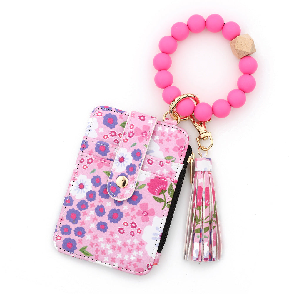 ID bag, silicone bracelet, floral folded edge card bag, TK printed leather wallet, keychain.