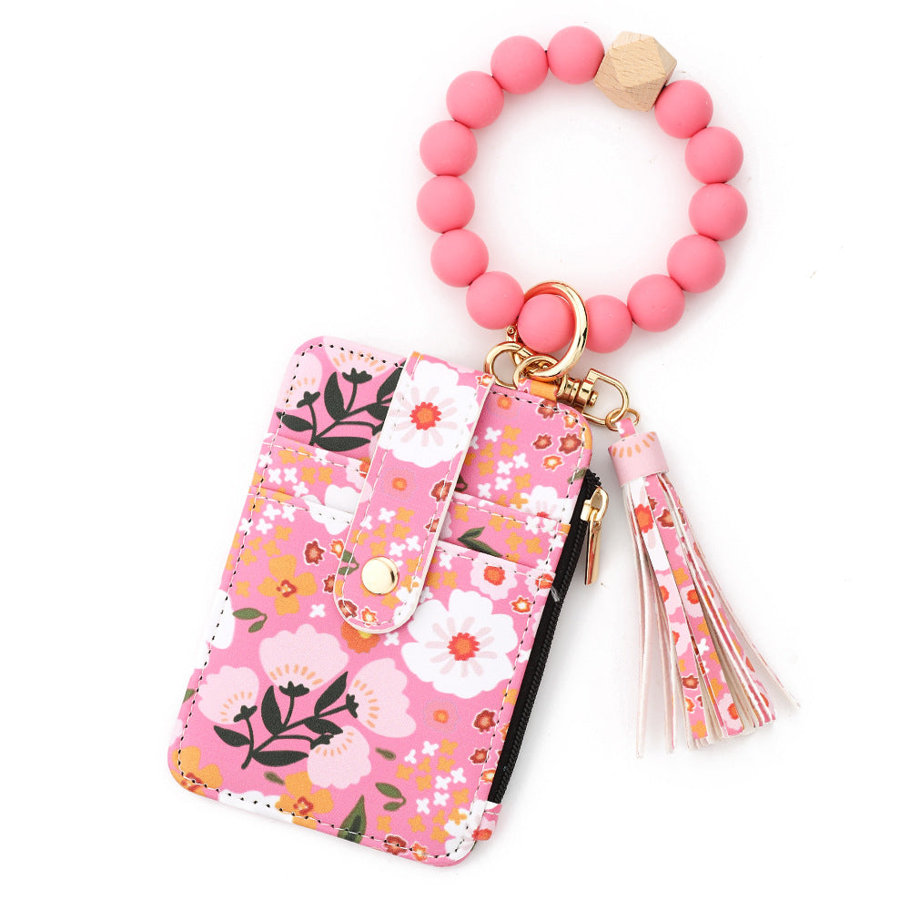 ID bag, silicone bracelet, floral folded edge card bag, TK printed leather wallet, keychain.