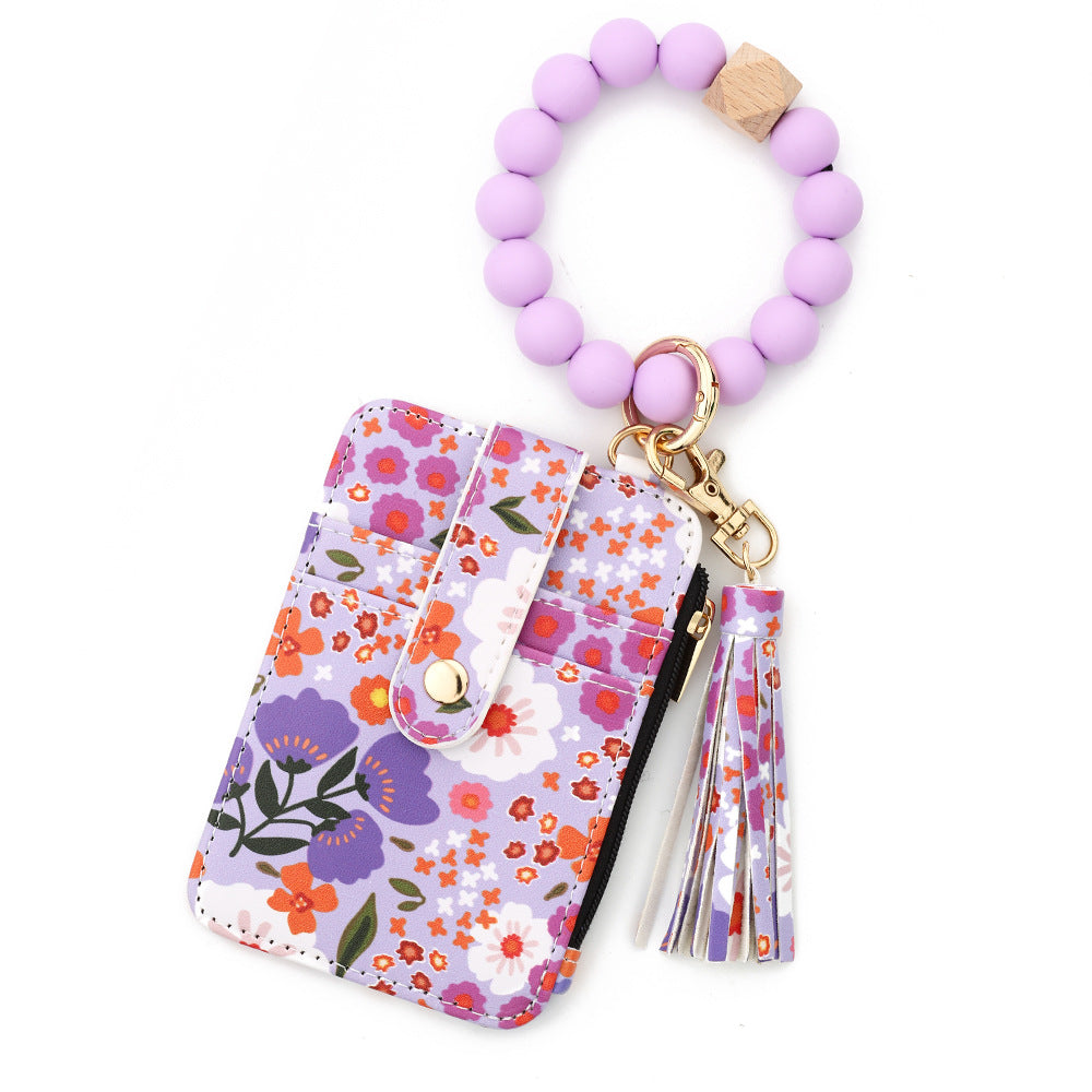 ID bag, silicone bracelet, floral folded edge card bag, TK printed leather wallet, keychain.